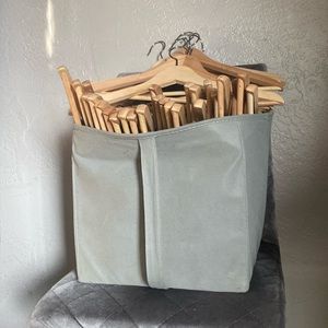 • Natural wood hangers